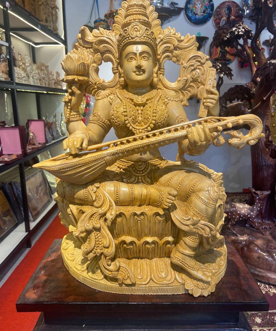 Handmade Sitting Saraswati Wooden Sculpture | Gallory Hive
