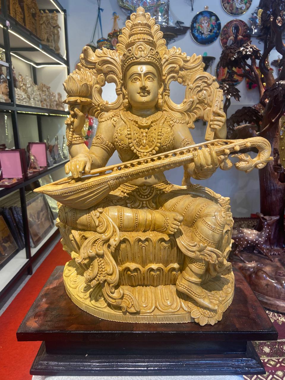 Handmade Sitting Saraswati Wooden Sculpture | Gallory Hive