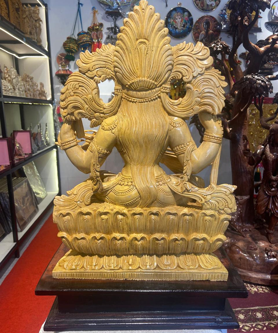 Handmade Sitting Saraswati Wooden Sculpture | Gallory Hive