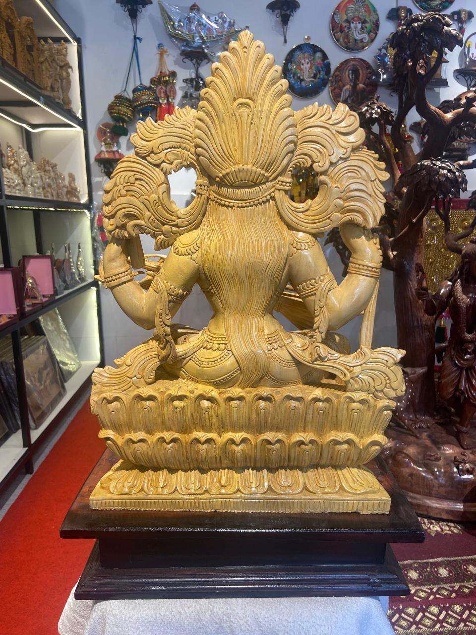 Handmade Sitting Saraswati Wooden Sculpture | Gallory Hive
