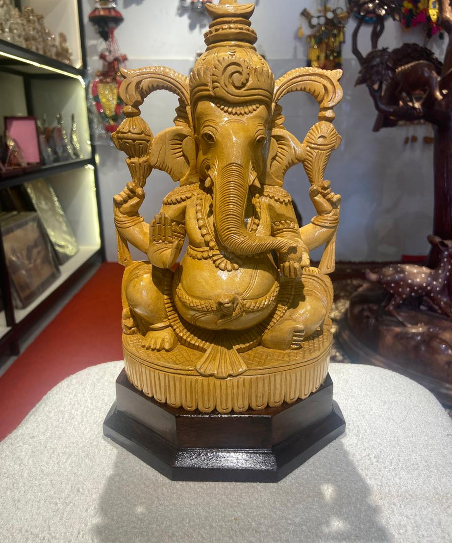 Handmade Sitting Lord Ganesha Wooden Sculpture | Gallory Hive