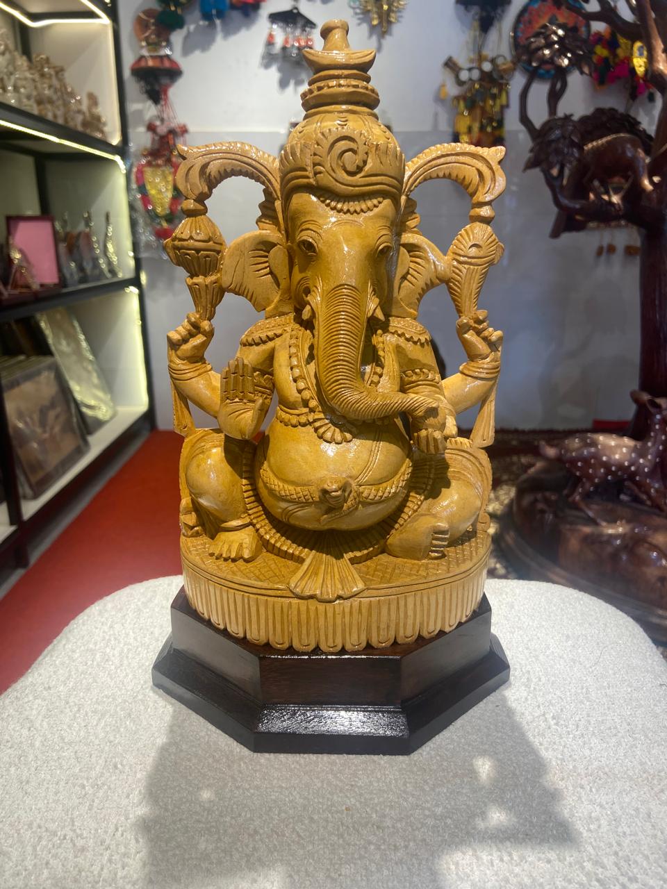 Handmade Sitting Lord Ganesha Wooden Sculpture | Gallory Hive