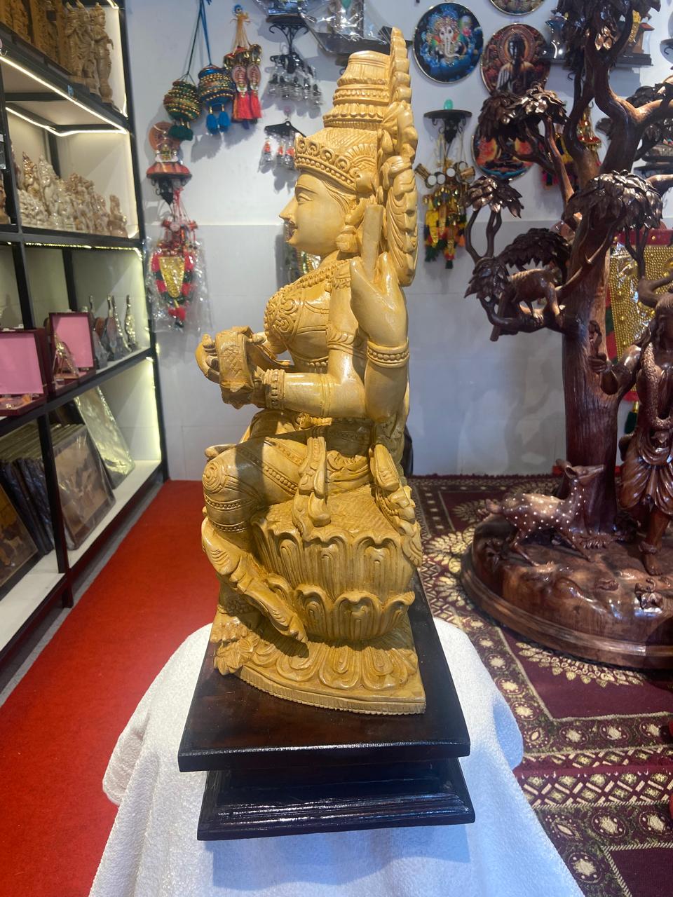 Handmade Sitting Saraswati Wooden Sculpture | Gallory Hive