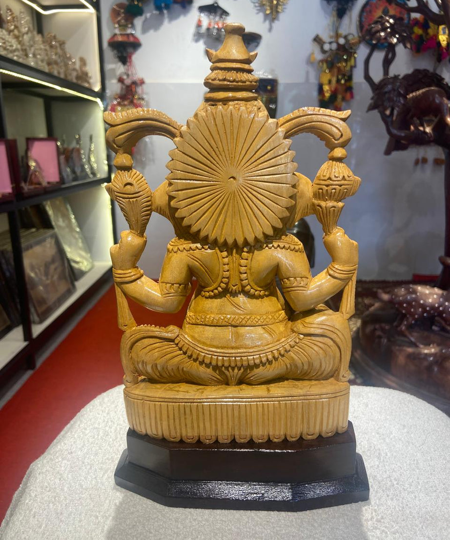 Handmade Sitting Lord Ganesha Wooden Sculpture | Gallory Hive