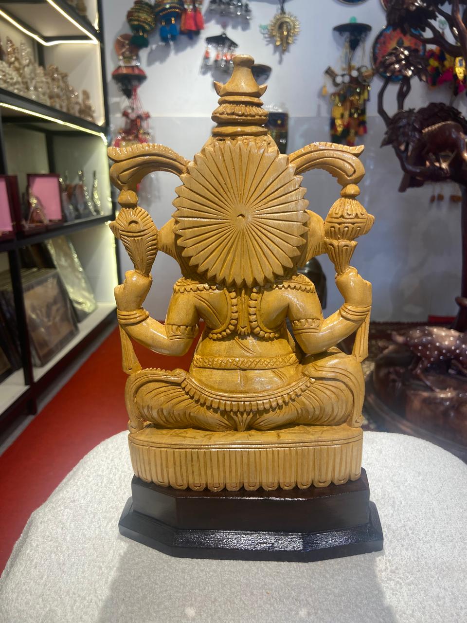 Handmade Sitting Lord Ganesha Wooden Sculpture | Gallory Hive