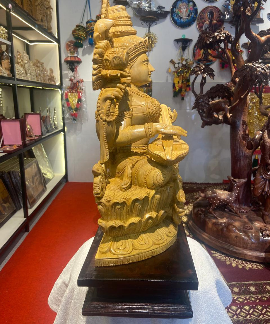 Handmade Sitting Saraswati Wooden Sculpture | Gallory Hive