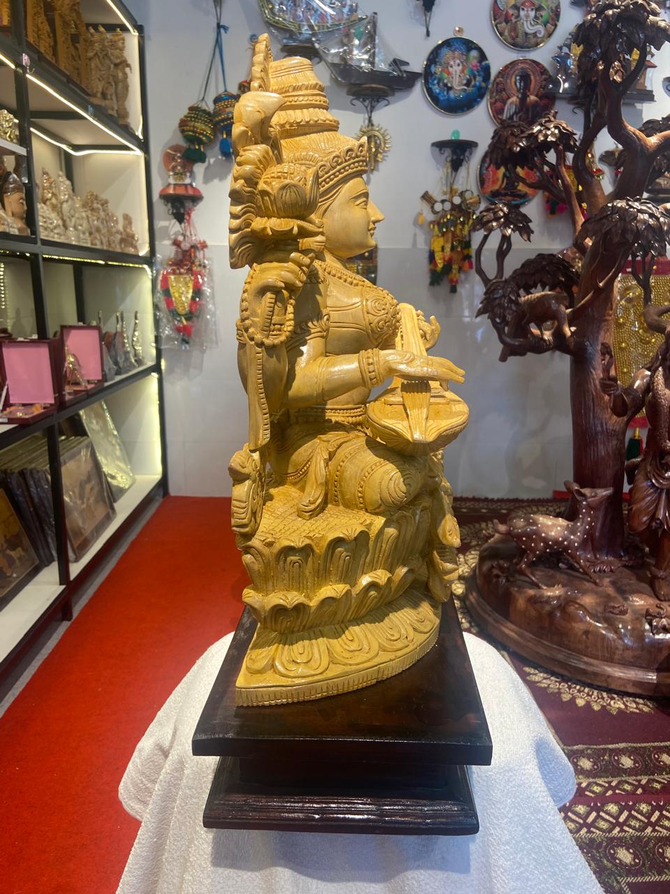 Handmade Sitting Saraswati Wooden Sculpture | Gallory Hive