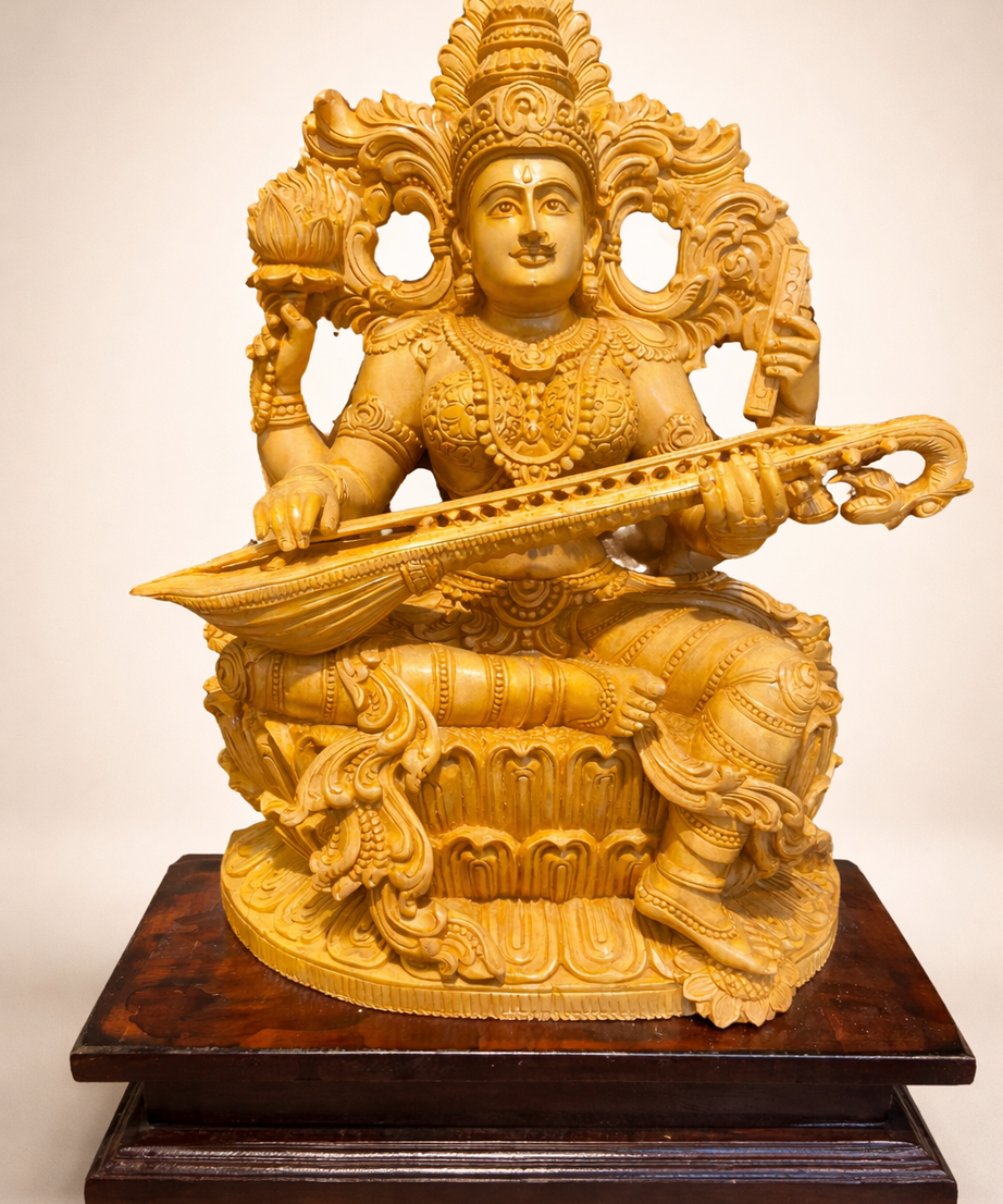 Handmade Sitting Saraswati Wooden Sculpture | Gallory Hive
