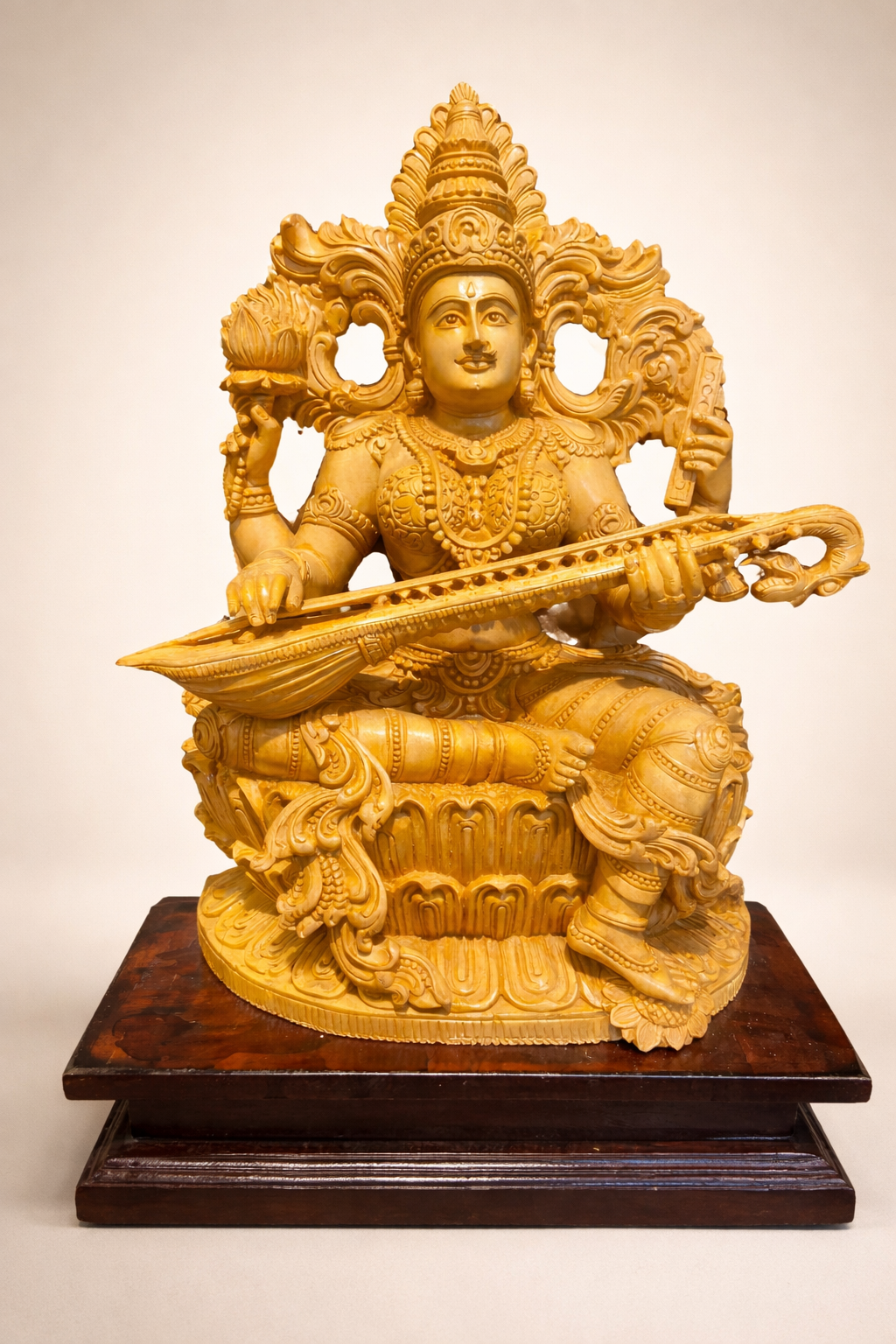 Handmade Sitting Saraswati Wooden Sculpture | Gallory Hive